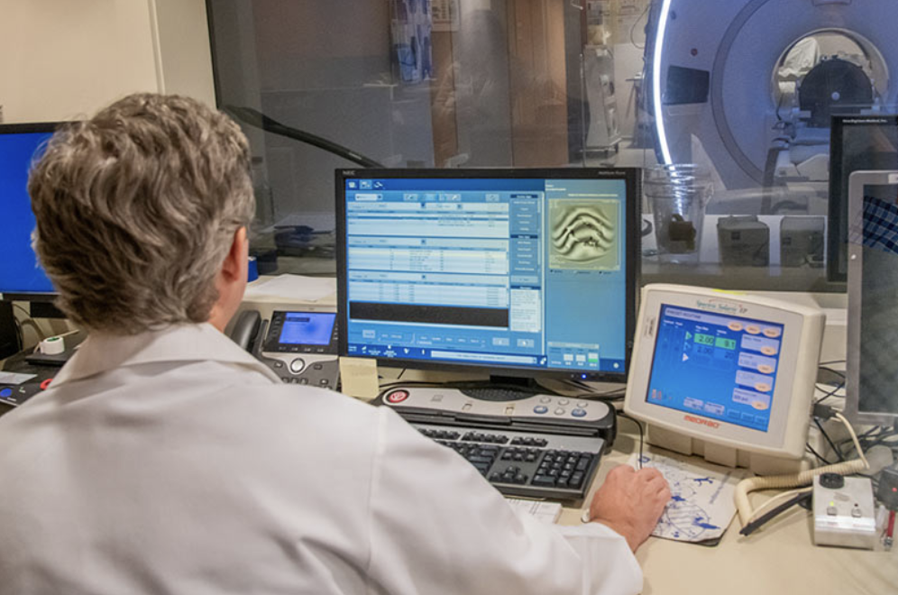 Physician perfoms brain scan